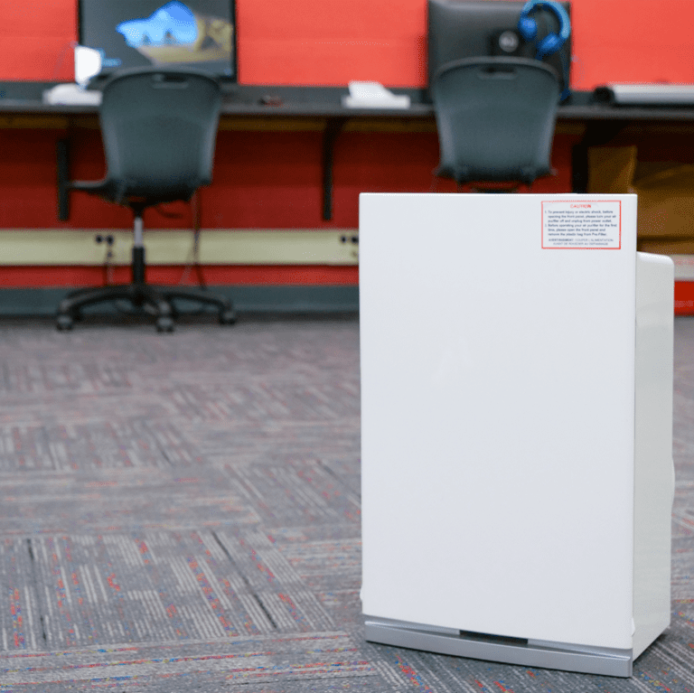 An Intellipure Compact air purifier in a computer lab.